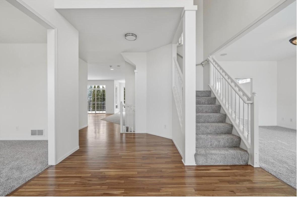 Highland Hills — entry and staircase renovation, hardwood floors